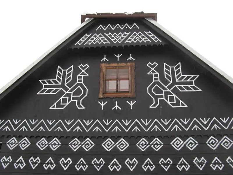 Painted log house in Čičmany