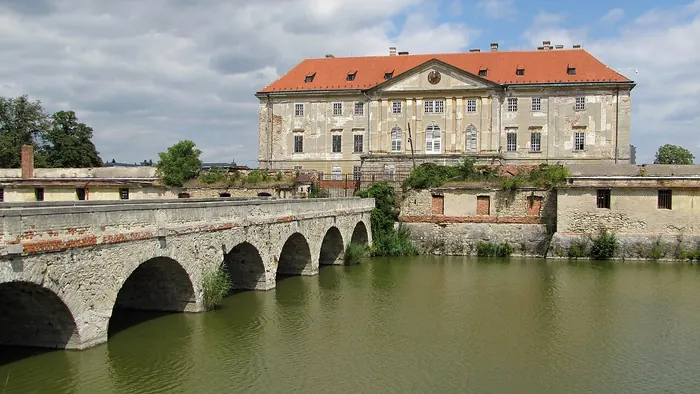 Holíč chateau behind a stone bridge and moat